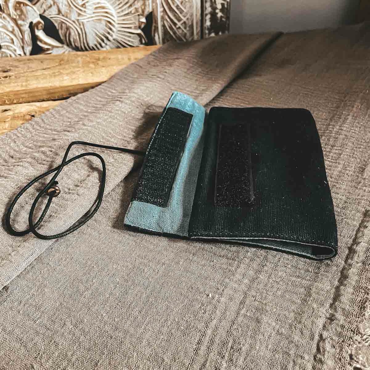 black tobacco pouch with velcro and string closure