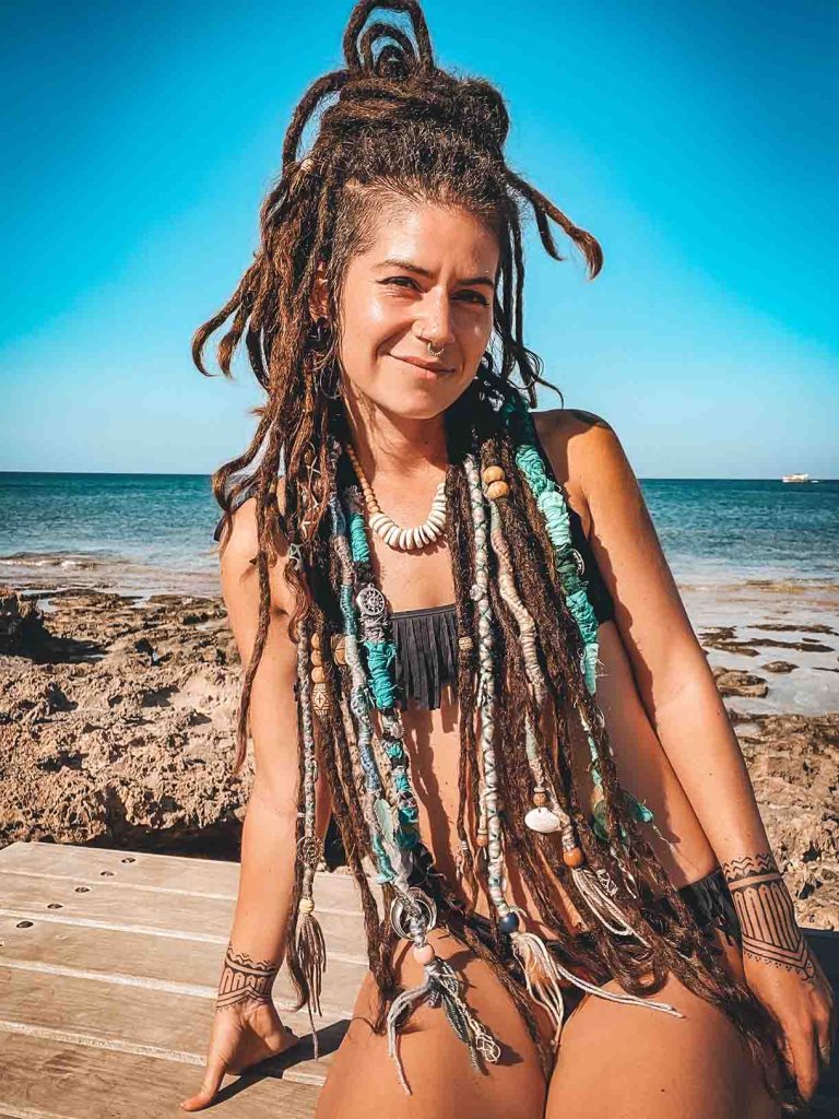 Dreadlock half bun and hair wraps and shells on a girl CrafterElena at the beach style