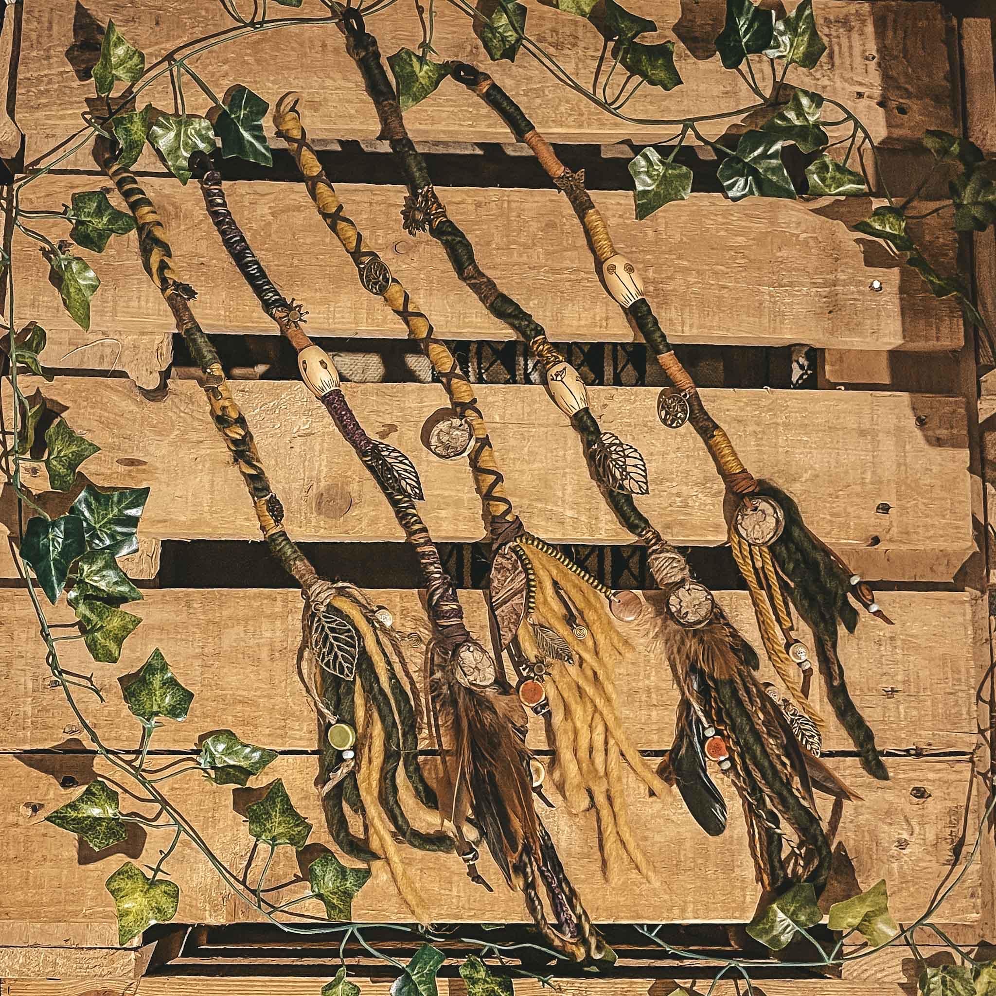 Nature’s Spirit Hair wrap Nature's spirit dreadlock hair wrap natural earthy style autumnal festival hair accessories in greens yellow orange, brown purple with pyrography beads burned with botanical theme,wooden pendants, feathers, mushrooms, sun and moon pendants