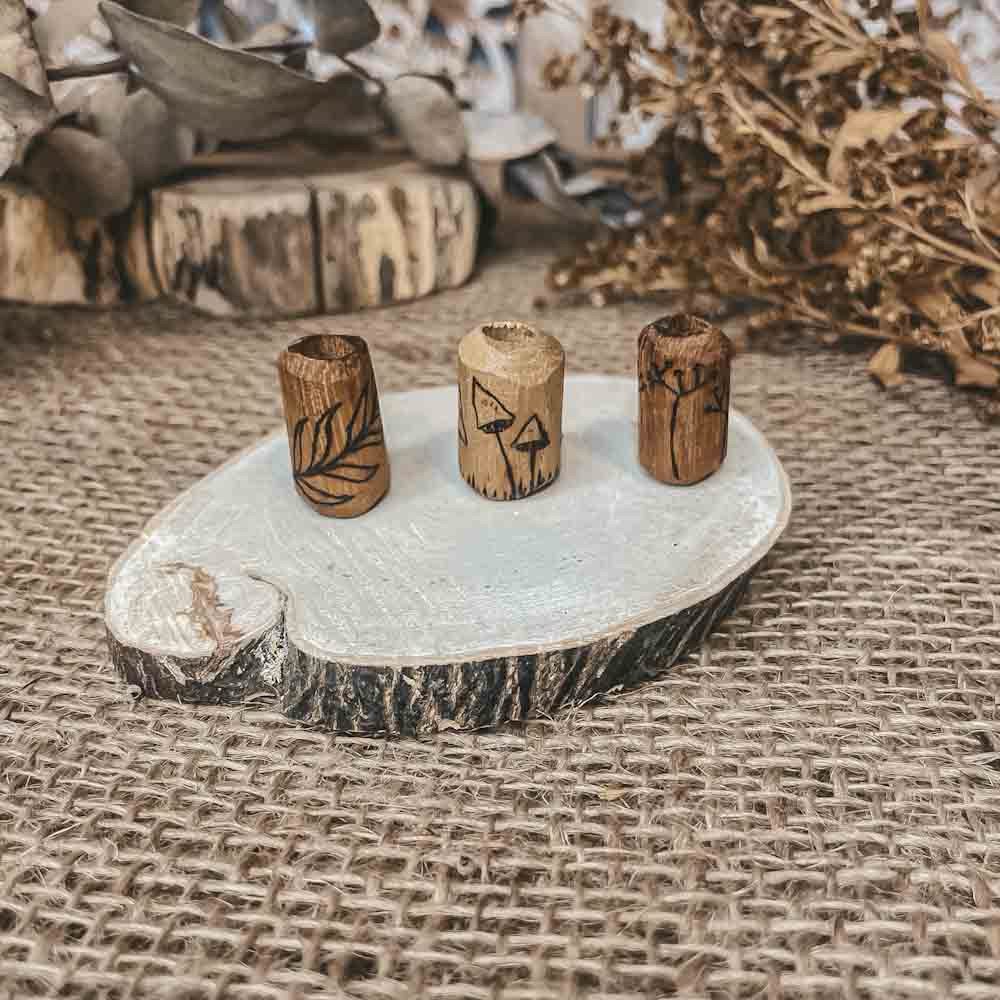 elderflower mushroom leaf pyrography design on iroco wooden dreadlock bead