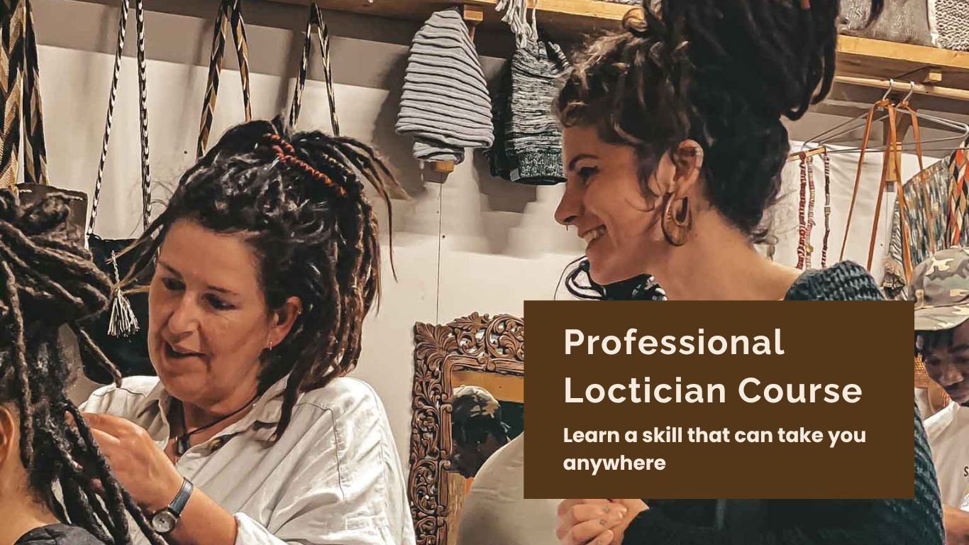 student learning how to make dreadlocks in person with teacher guiding
